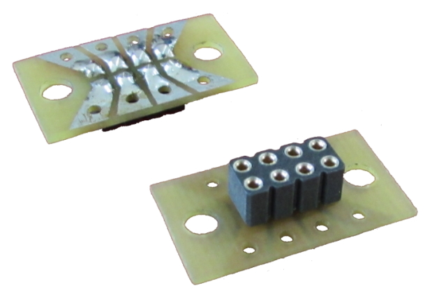 Model JTEDCCS1. Small board to allow installation of an 8-pin DCC socket into a locomotive.