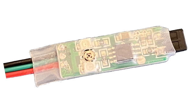 Model JTEILD. Uses infrared to detect presence of a locomotive passing by the sensor, without modifying the locomotive in any way. Detection range (of a sheet of white paper) up to 80mm.