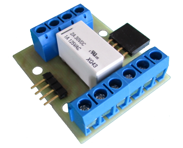 Model JTELR1. 12V DPDT latching relay which holds its state after power is removed from control coils. Ideal for use in train crontrol to switch track power or turnout motors